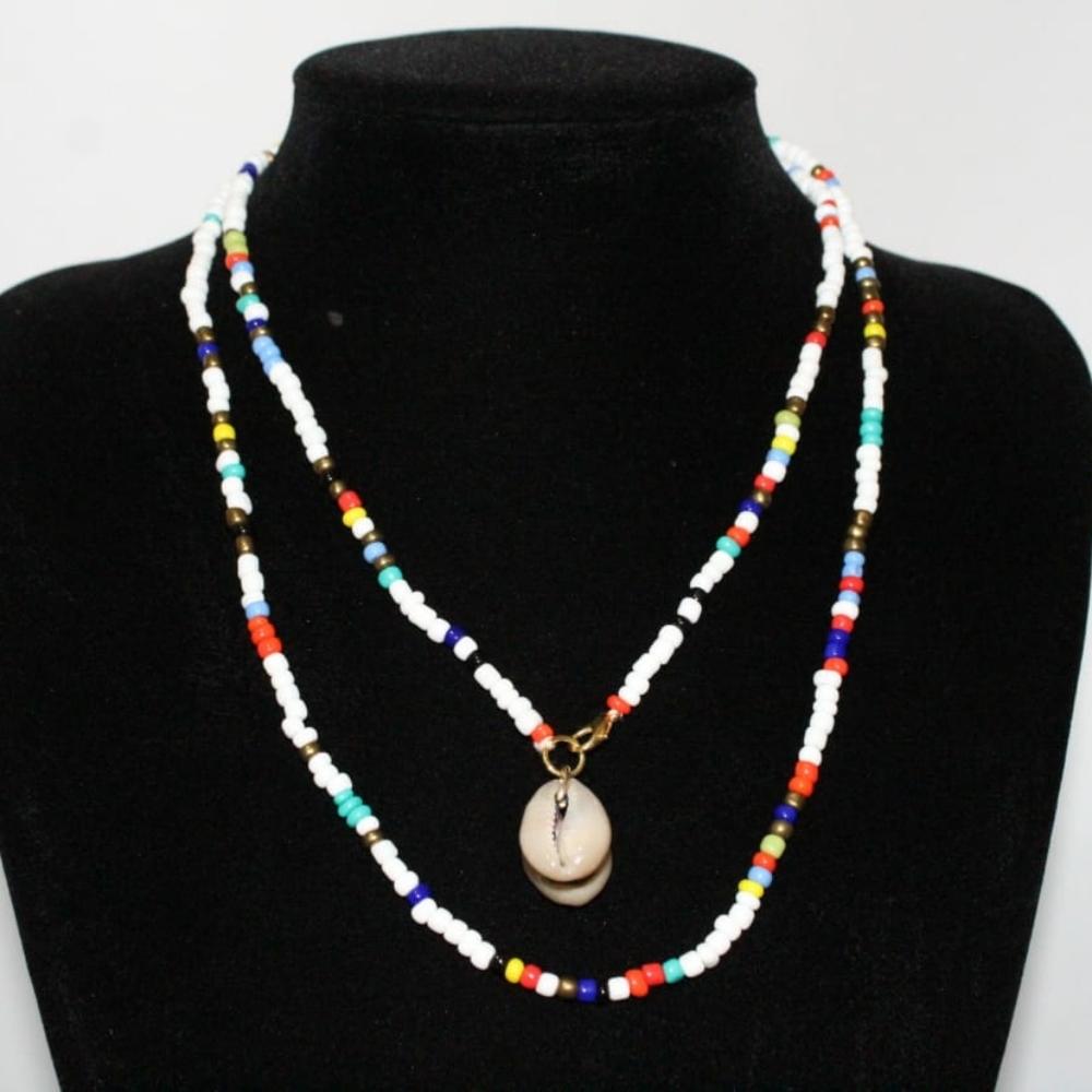 Necklace made with bead and cowrie shell